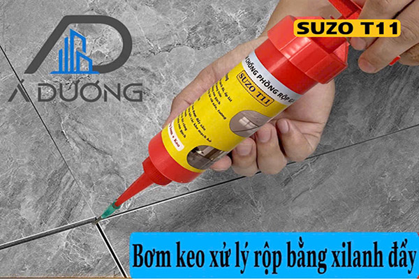 Bơm keo xử lý phồng rộp gạch bằng Suzo T11